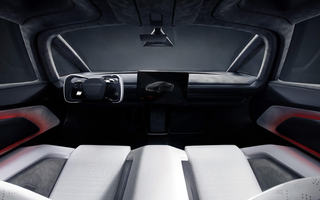 Interior do Tesla Roadster com volante compacto, tela central e bancos claros