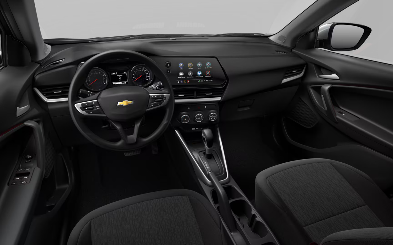 Imagem digital oficial do painel do Chevrolet Tracker AT, com central MyLink e câmbio automático