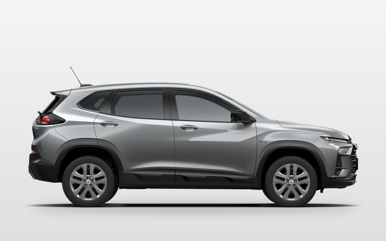 Imagem digital oficial do Chevrolet Tracker AT prata visto de perfil